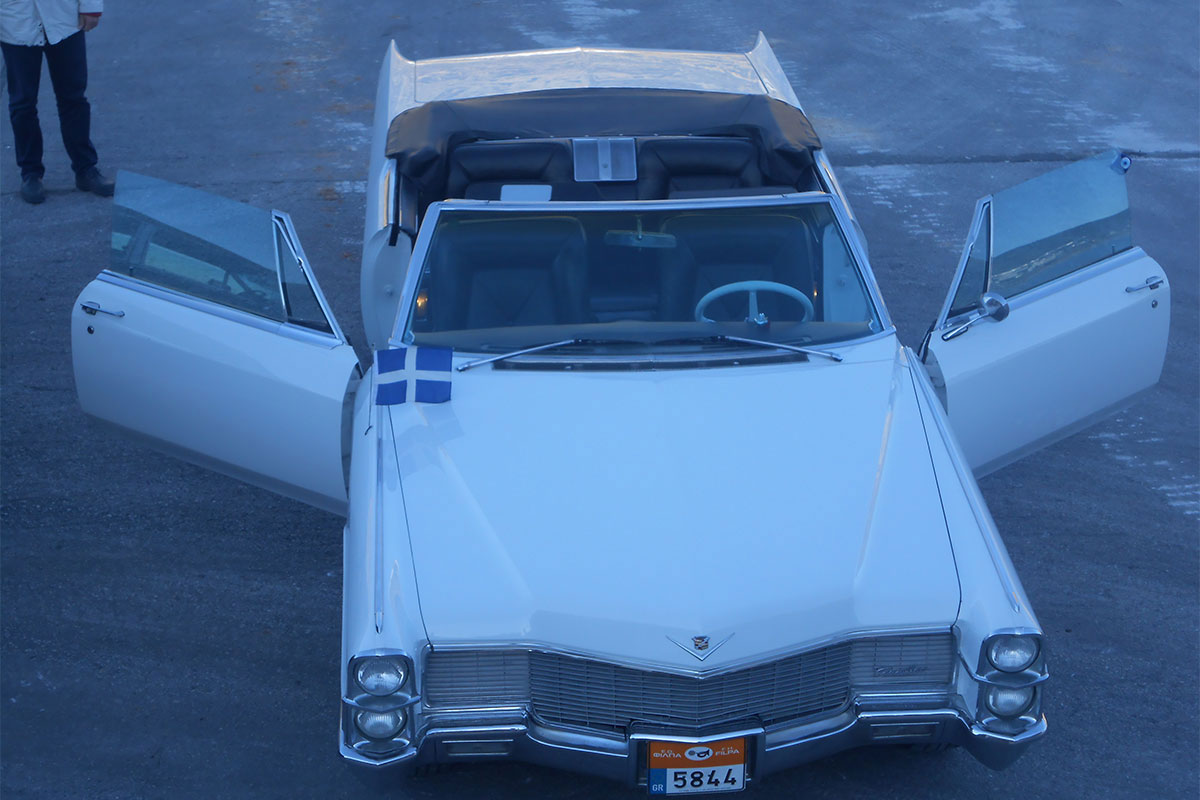 Transportation with an antique car at Sifnos