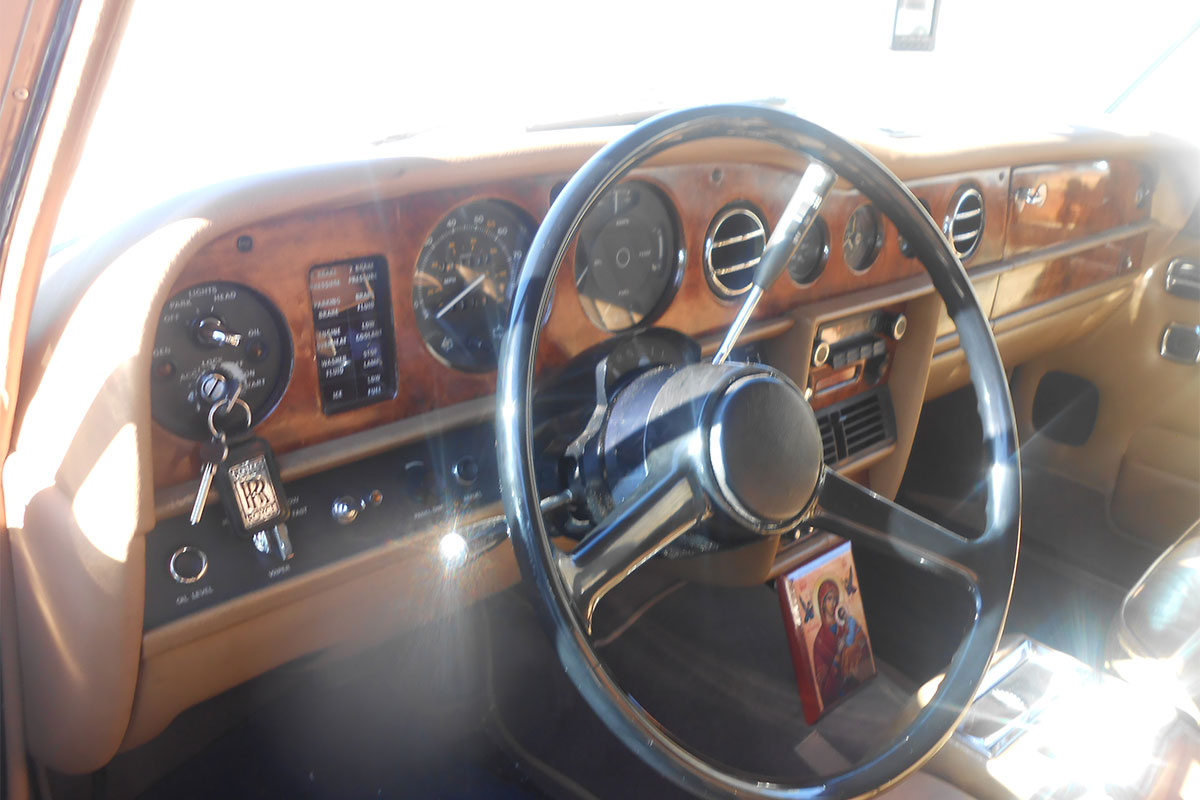 Transportation with an antique car at Sifnos