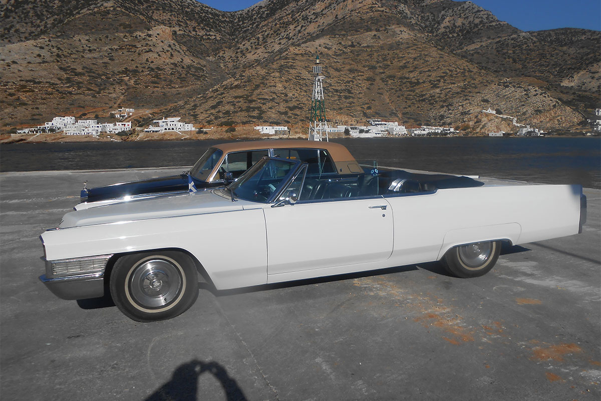 Transportation with an antique car at Sifnos